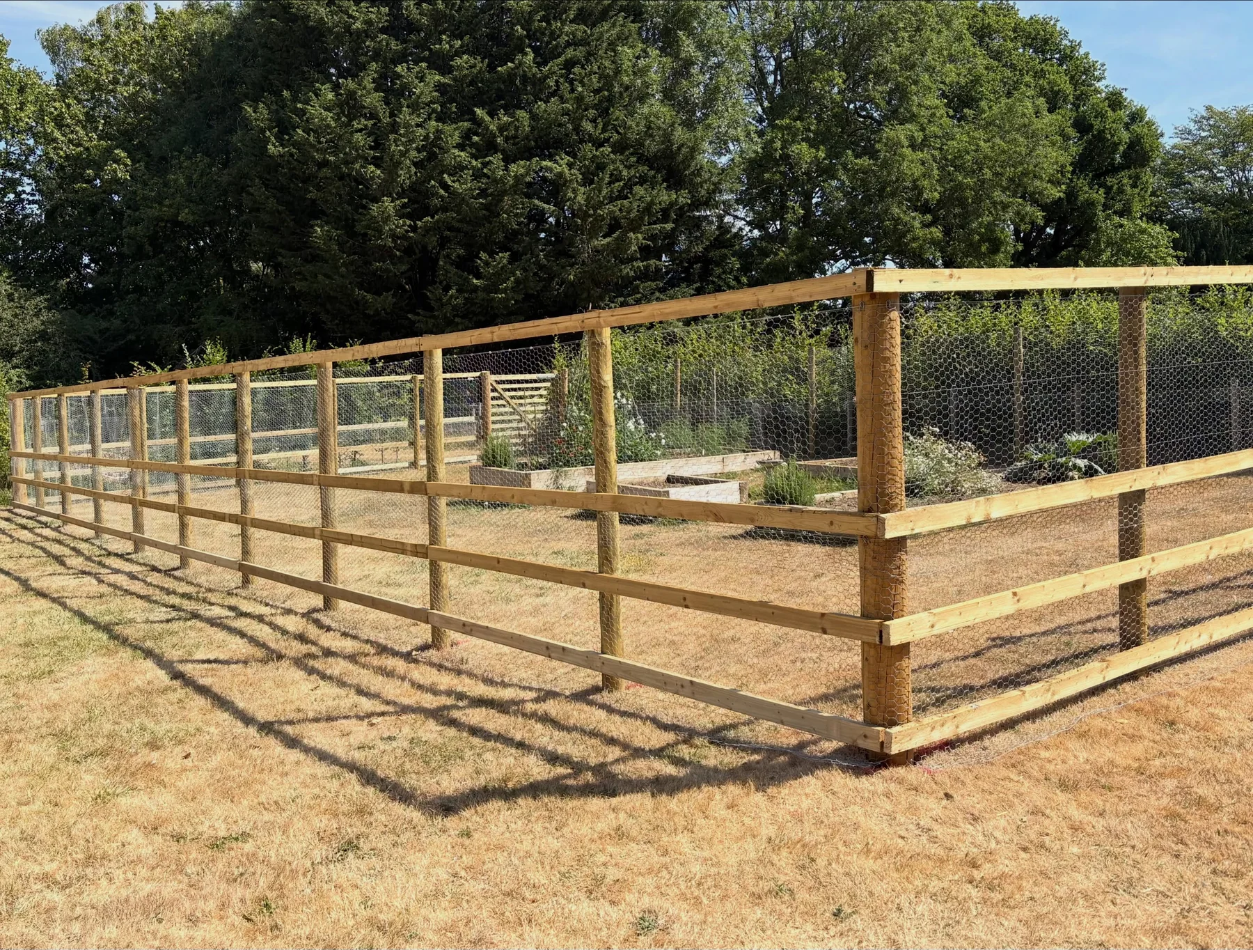 Timber garden enclosure installed by WGT Fencing