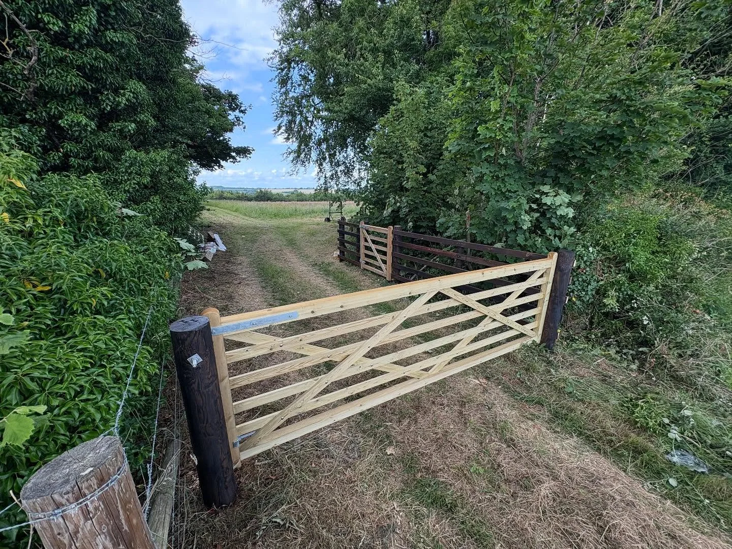 New timber field gate at a rural access point